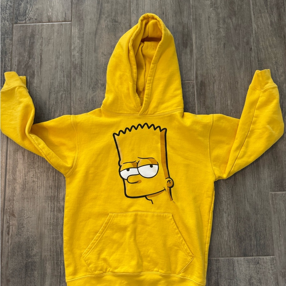 Yellow Hoodie with Cartoon Graphic